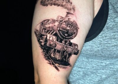 tattoo-harry potter zug-oberarm-tattoo-artist-tintenbunker-tattoo-studio-herz-in-tinte.jpg